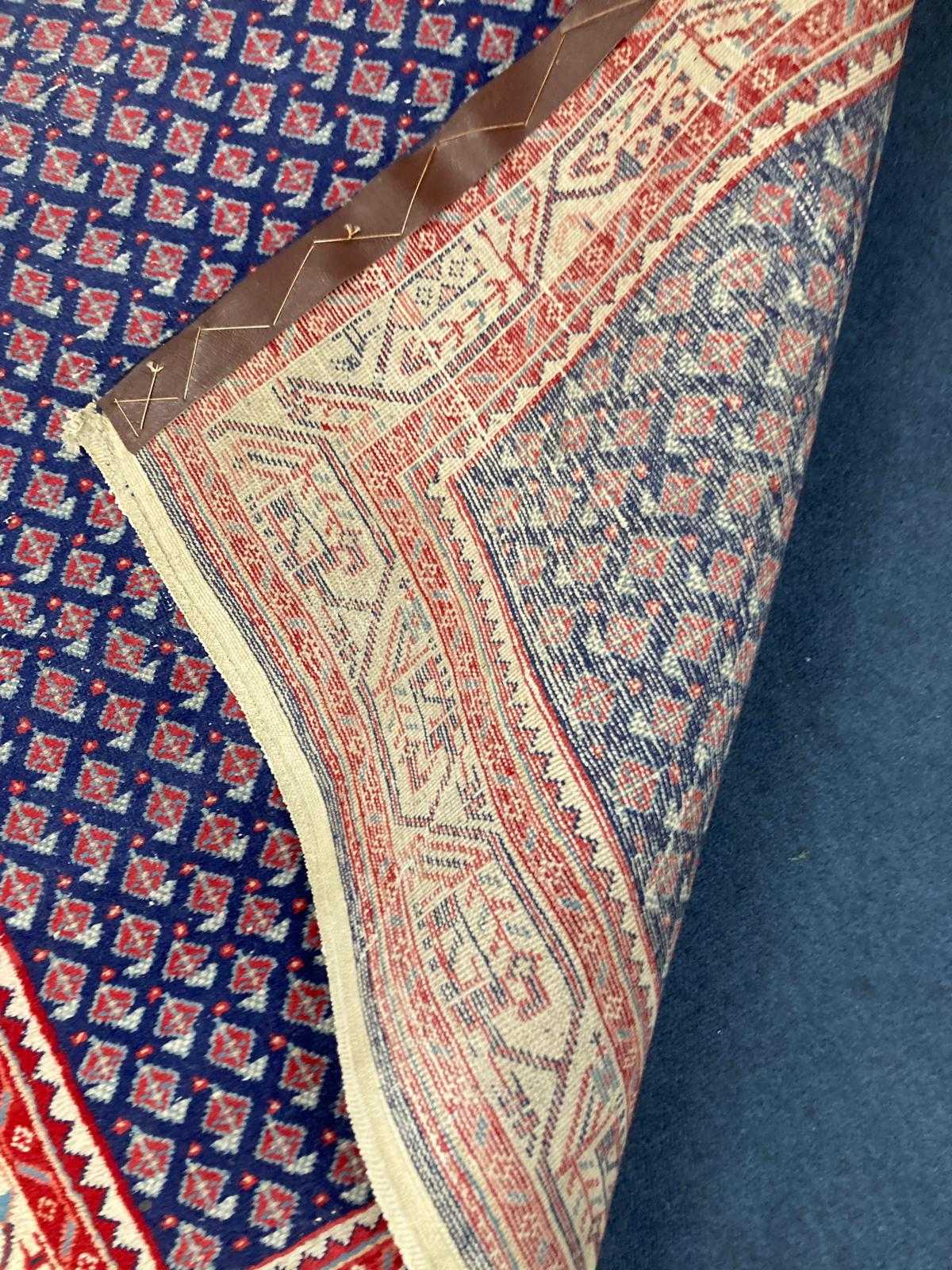 A North West Persian blue ground rug, 160 x 100cm
